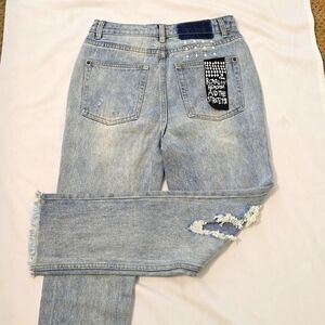 DESIGN SASA DISTRESSED JEANS SIZE MEDIUM.